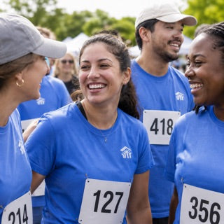 Charity walk and run participants in matching event tees