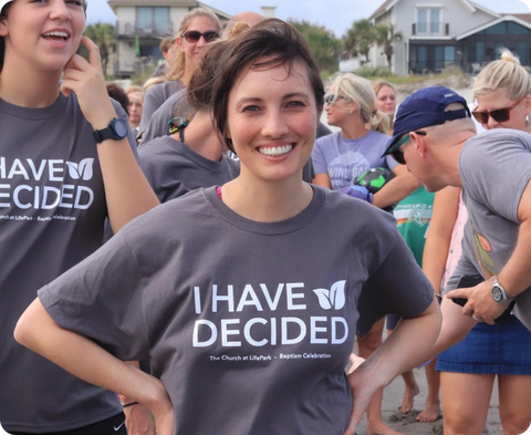 Supporter wearing a custom cause t-shirt at an event