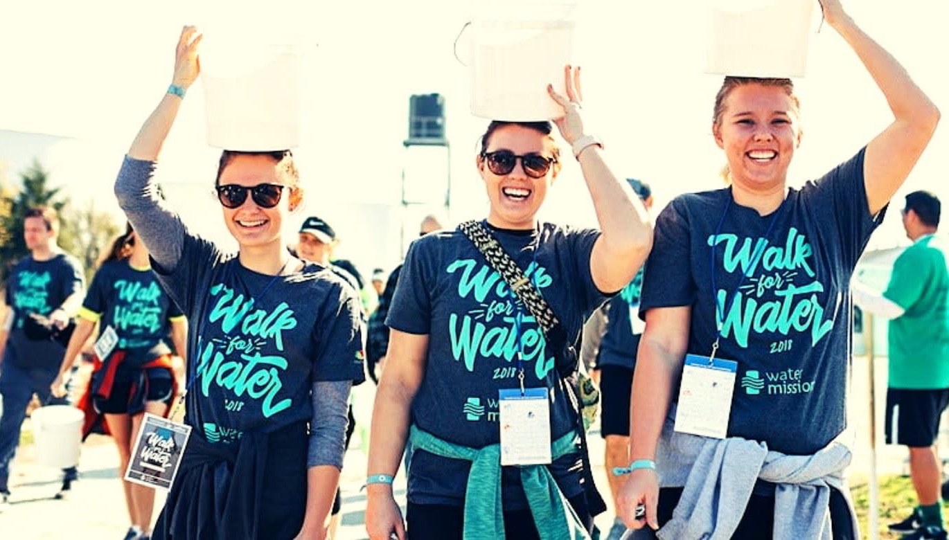 Event volunteers in matching bulk-printed shirts